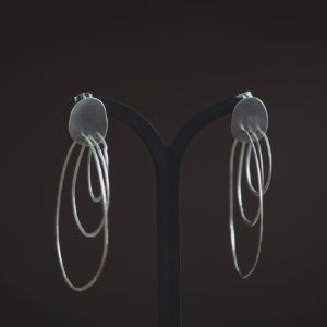 Silver hoop earrings with disc stud detail