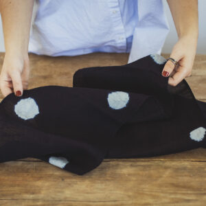 Long dark indigo scarf showing detail of the dye resistance