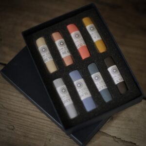 set of eight soft pastels in soft tones suitable for portraiture. 